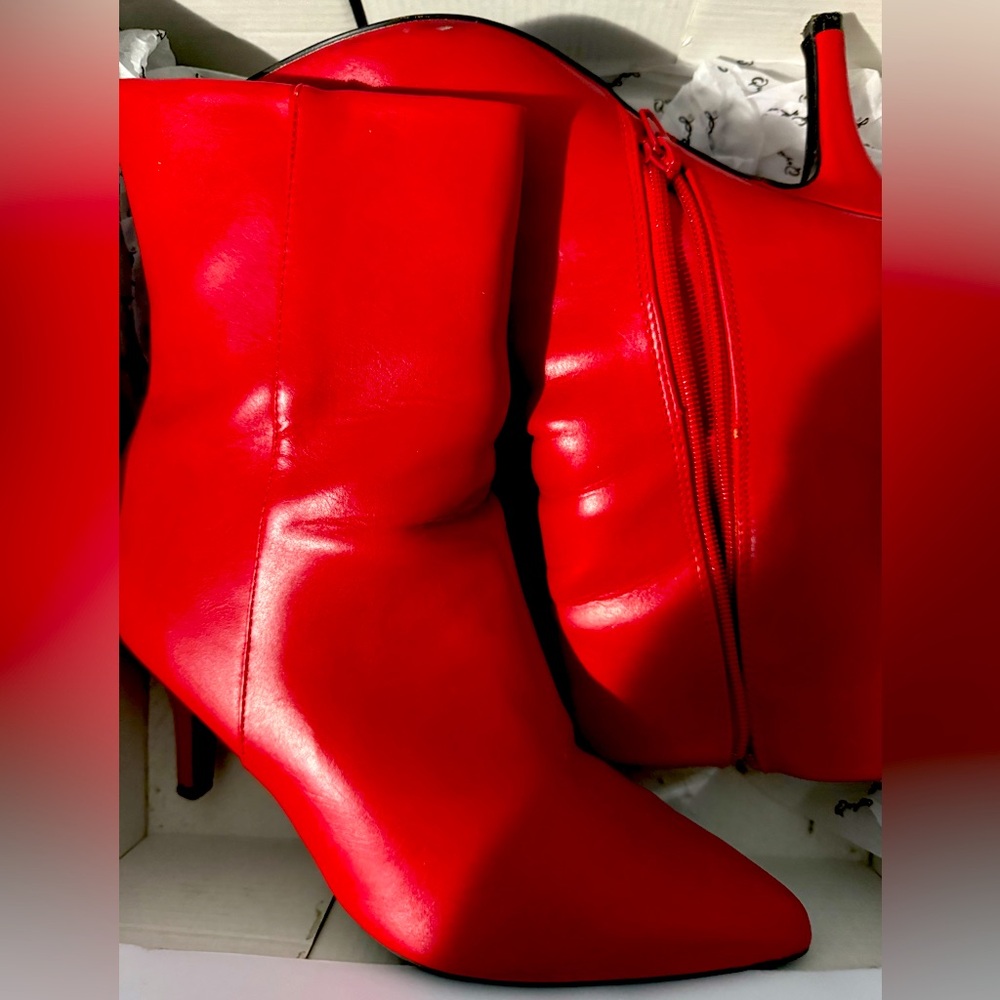 Red Ankle Boots-PORTIA BRAND
Side zipper 
Size 9
Small heel